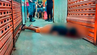 Pistoleiro com farda de Águas de Manaus executa jovem em feira
